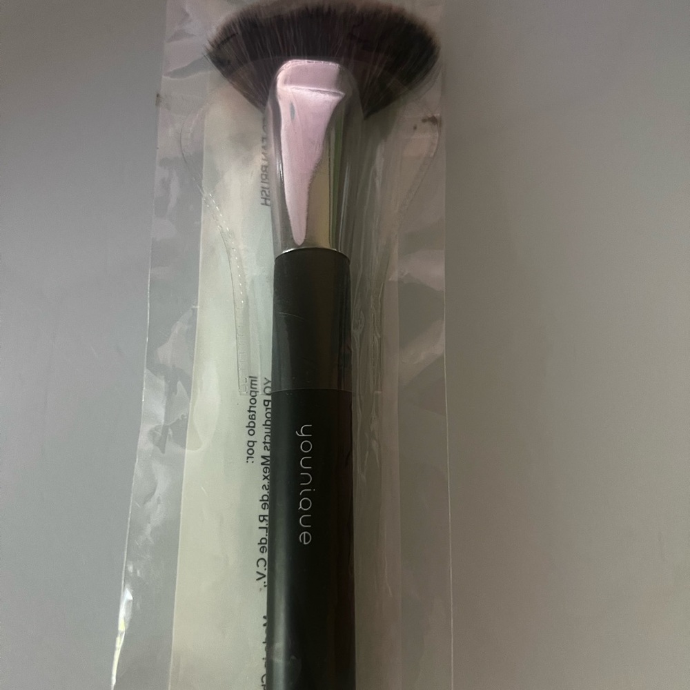 Younique Angled fan brush. Brand new still in package.